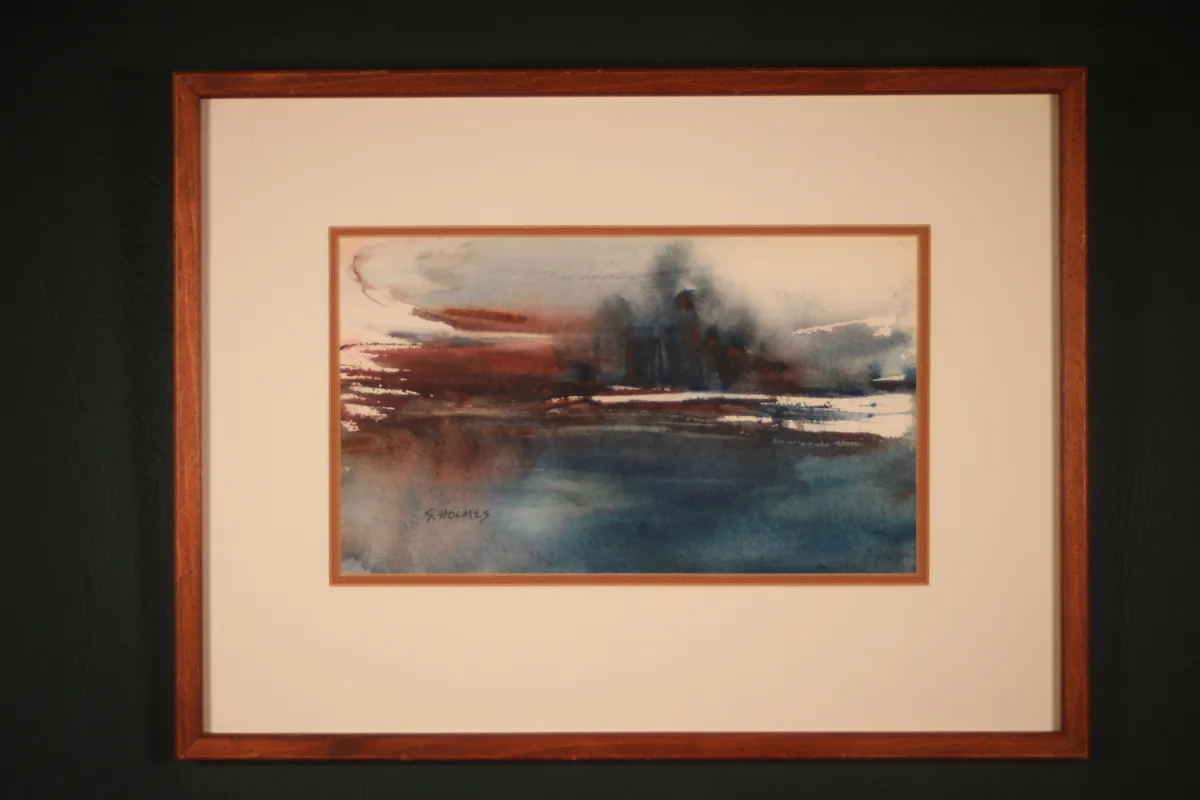 Sherry H. Holmes, Cherry Valley, original watercolor depicting a snow-covered rural winter landscape with pale ground, darker trees, and sparse vegetation. Signed and presented in its existing frame.